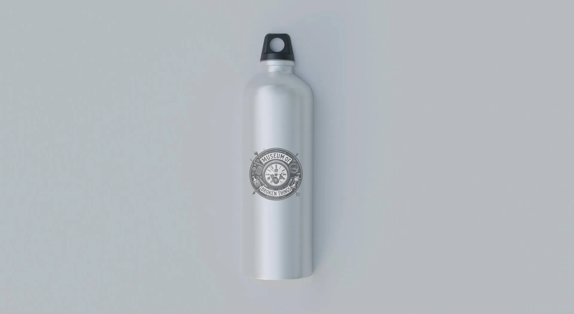 Tall stainless steel water bottle with black cap, with the Museum logo on the side